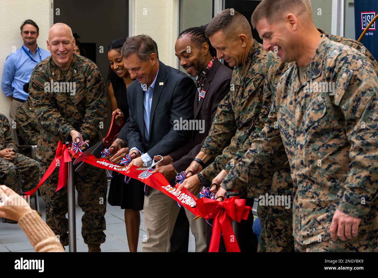 Uso Ribbon Cutting Marine and USO leaders cut the ribbon signifying the opening of a new ...
