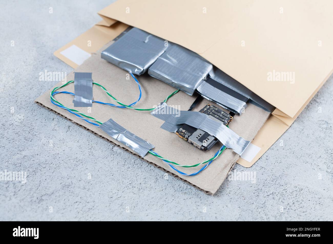 Mail bomb IED Improvised Explosive Device with c4 and cell phone