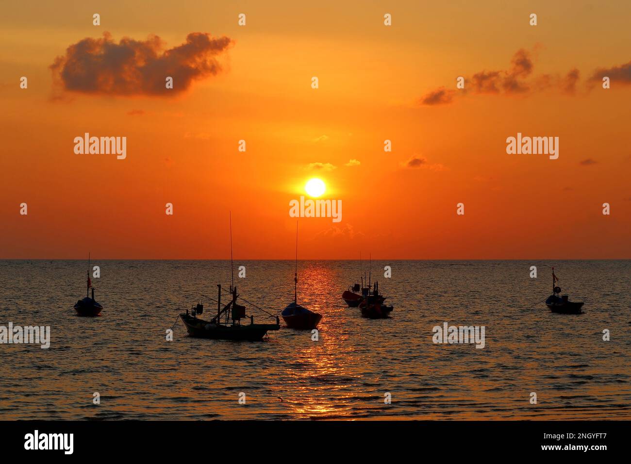 fishing boat in the sea with beautiful sunset background Stock Photo ...