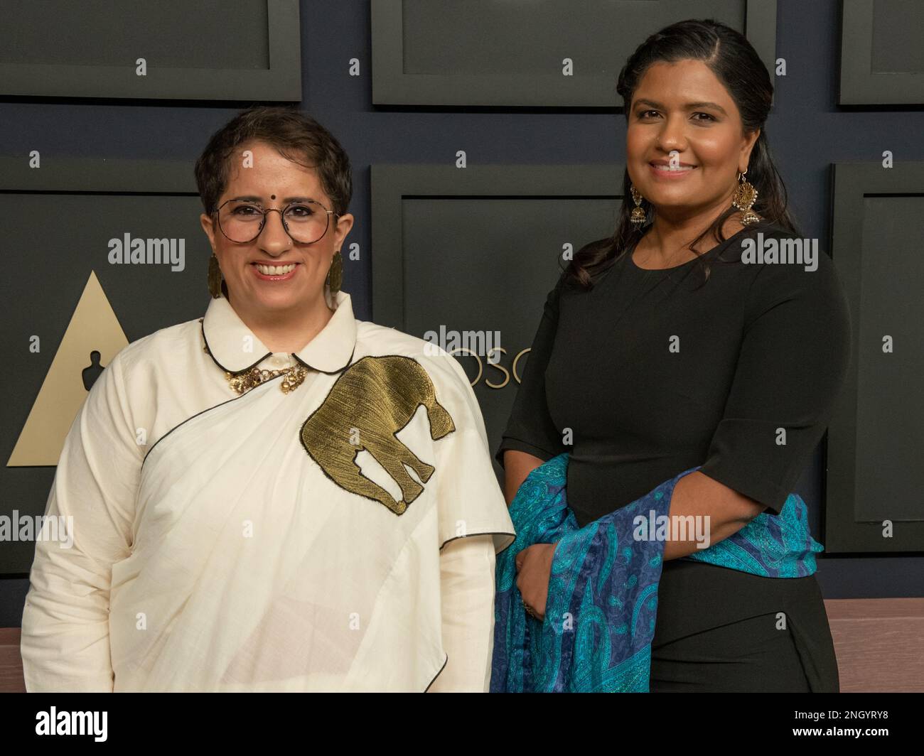 February 13, 2023, Beverly Hills, California, USA: Guneet Monga and Kartiki Gonsalves attends the Academy Awards 2023 Oscars Nominee Luncheon. (Credit Image: © Billy Bennight/ZUMA Press Wire) EDITORIAL USAGE ONLY! Not for Commercial USAGE! Stock Photo