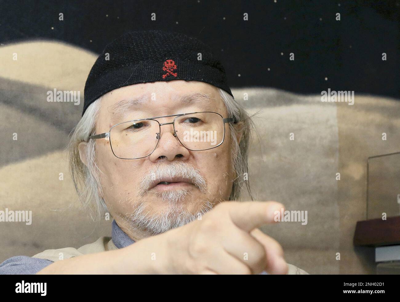 A file photo shows Japanese manga artist Leiji Matsumoto in Tokyo on July 22, 2014. Matsumoto who is famous for Space Battleship Yamato, Space Pirate Captain Harlock, Galaxy Express 999 died on Feb. 13, 2023 at the age of 85. ( The Yomiuri Shimbun via AP Images ) Stock Photo