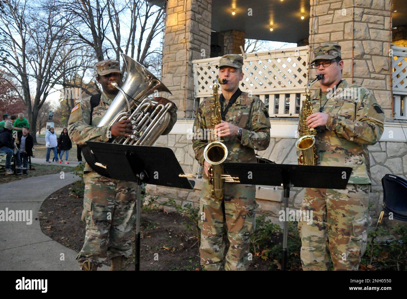 Spc. Najestyk Jordan (left), Sgt. 1st Class Matt Crandall and Sgt. Kevin Arbogast of the 312th Army Band, perform at the Fort Leavenworth holiday tree lighting at Zais Park. Stock Photo