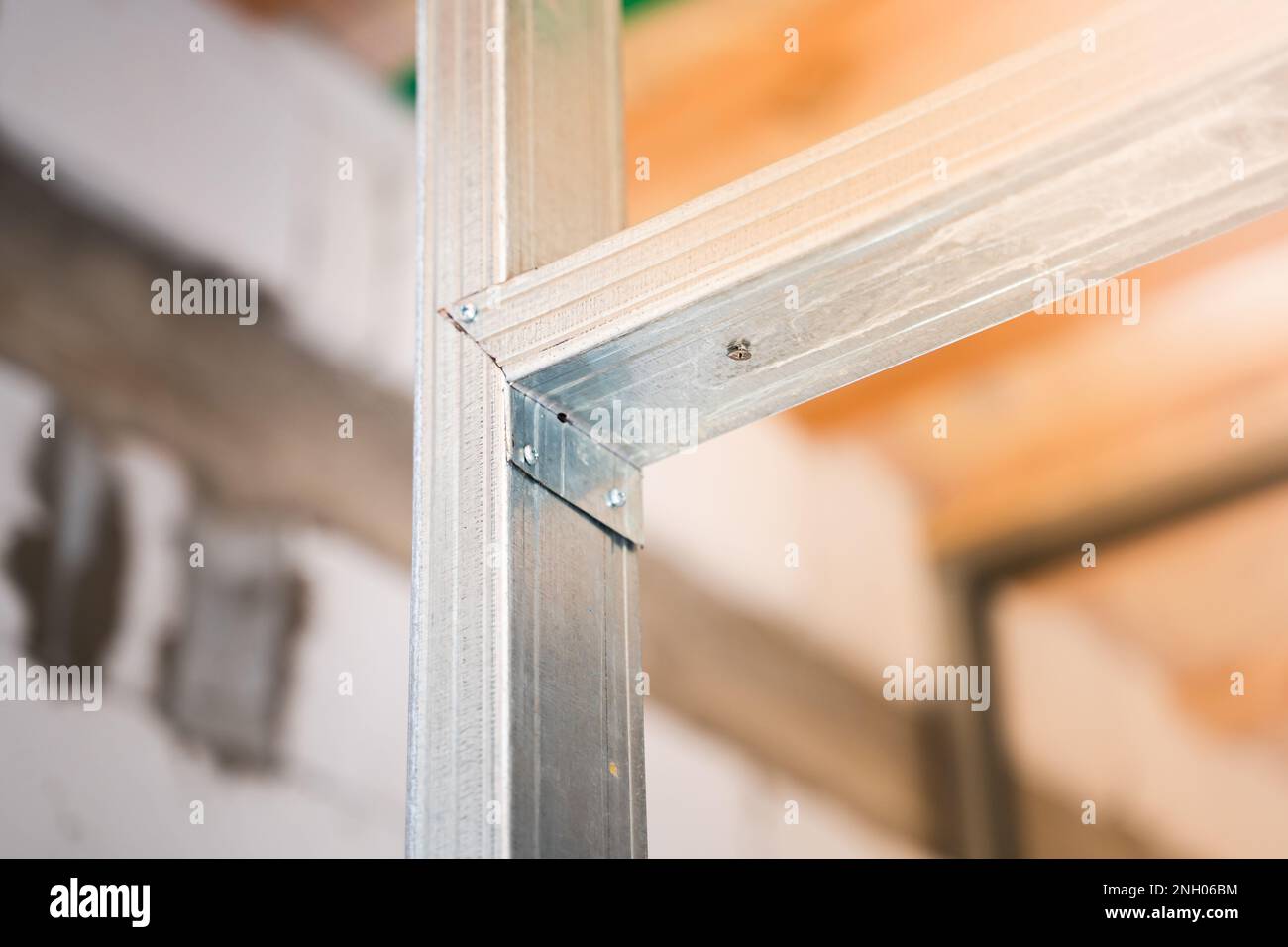 The use of selftapping screws with a drill in an interior partition