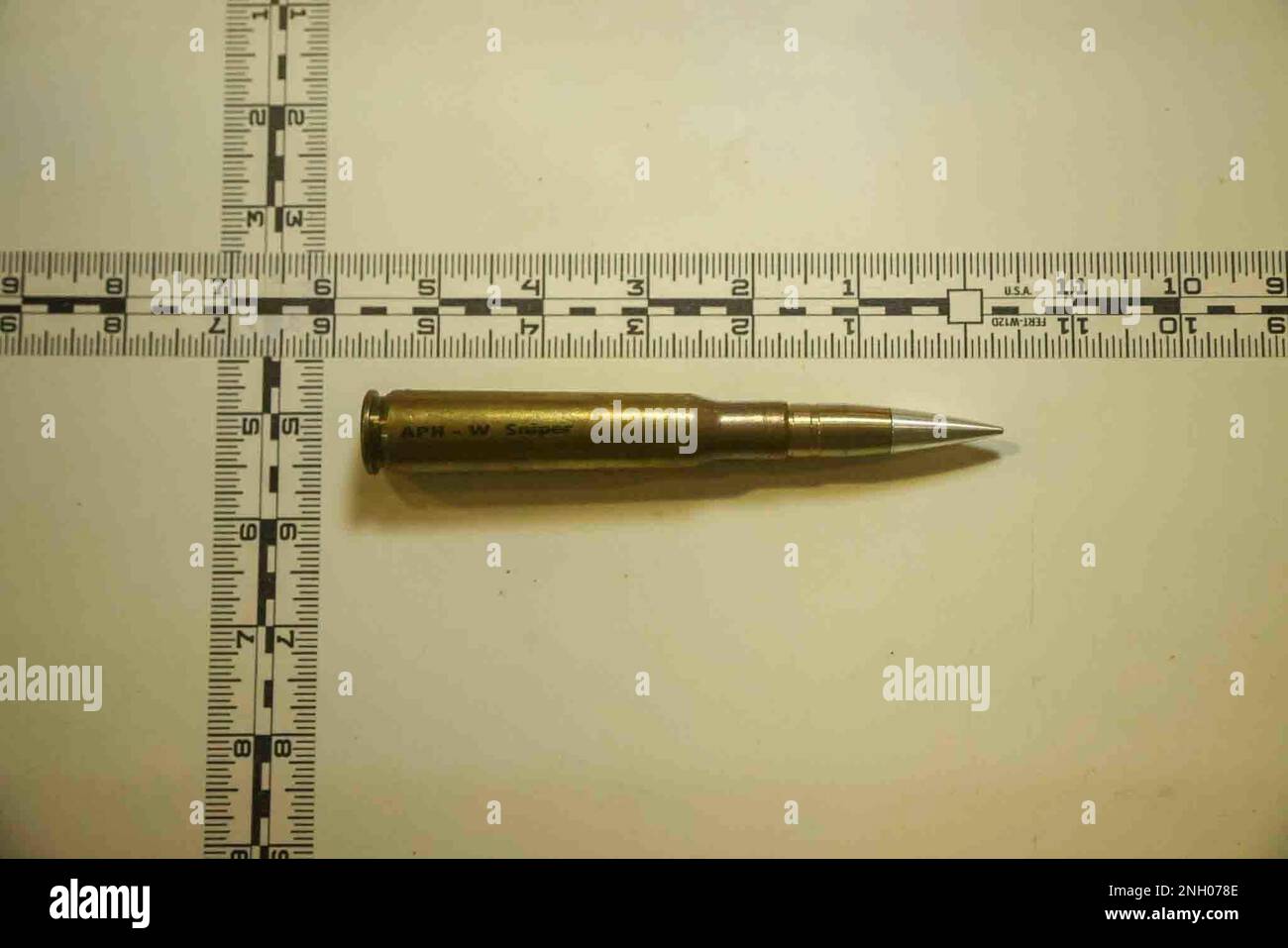 221203-N-NO146-1002 GULF OF OMAN (Dec. 3, 2022) Photo taken Dec. 3 of an individual round of 12.7mm ammunition seized from a fishing trawler interdicted by expeditionary sea base USS Lewis B. Puller, Dec. 1, in the Gulf of Oman. Forces from Lewis B. Puller found more than 1 million rounds of 7.62mm ammunition; 25,000 rounds of 12.7mm ammunition; nearly 7,000 proximity fuses for rockets; and over 2,100 kilograms of propellant used to launch rocket propelled grenades. Stock Photo