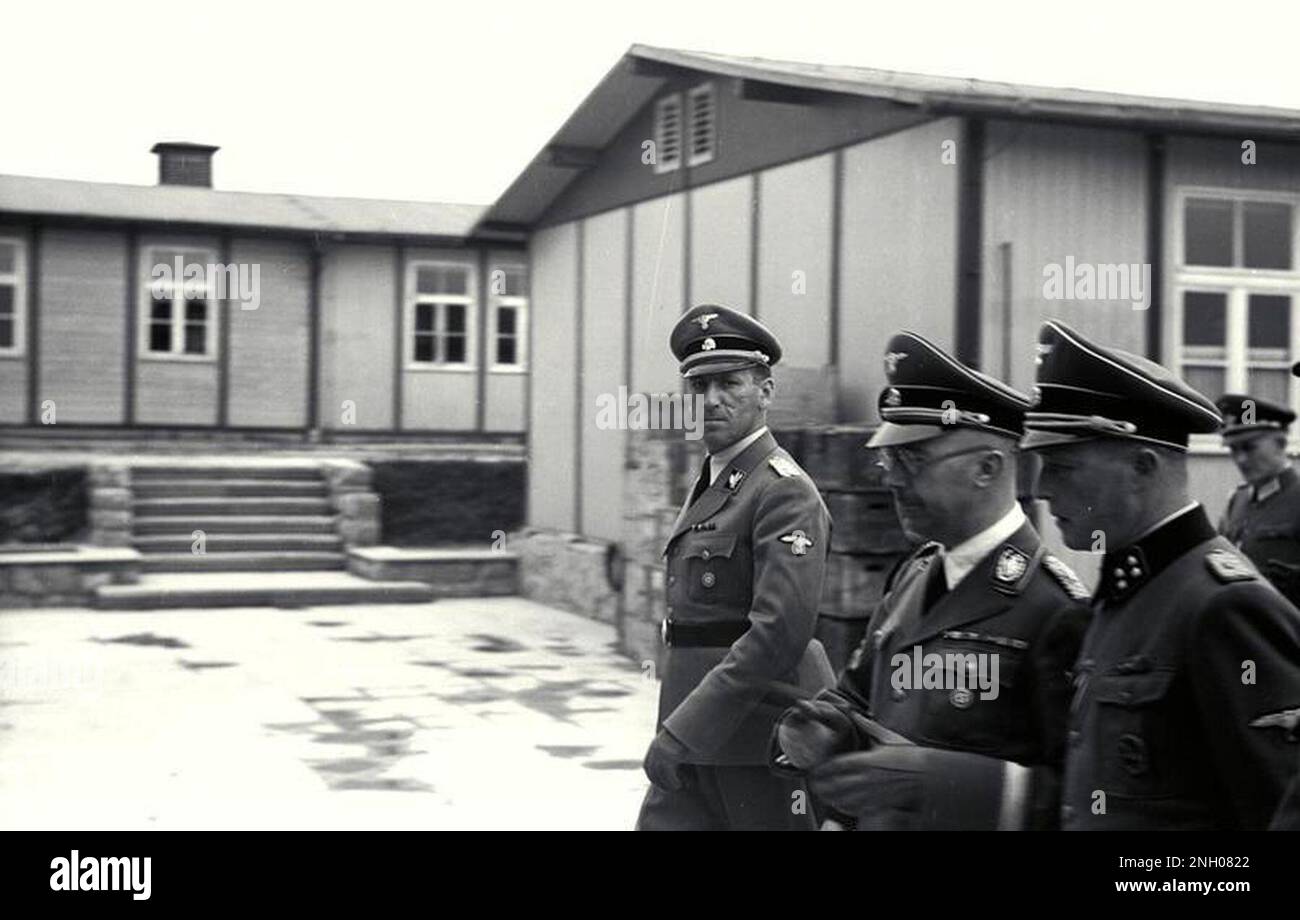 Ernst Kaltenbrunner, Heinrich Himmler and August Eigruber (in black) inspect Mauthausen concentration camp in 1941, in the company of camp commander Franz Ziereis (center left). Photo Bundesarchiv, Bild 192-029 / , https://commons.wikimedia.org/w/index.php?curid=5485427 Stock Photo