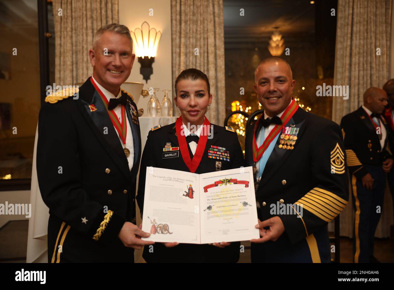 Warrant Officer 4 Anca Gavrilut, G2, 32d AAMDC, was inducted into the Honorable Order of Saint Barbara during the Saint Barbara's Social, December 3rd at the Plaza Hotel in El Paso, Texas  The Honorable Order of Saint Barbara is awarded to personnel who have served honorably and with distinction as a member of the Artillery or part of an Artillery unit. Stock Photo