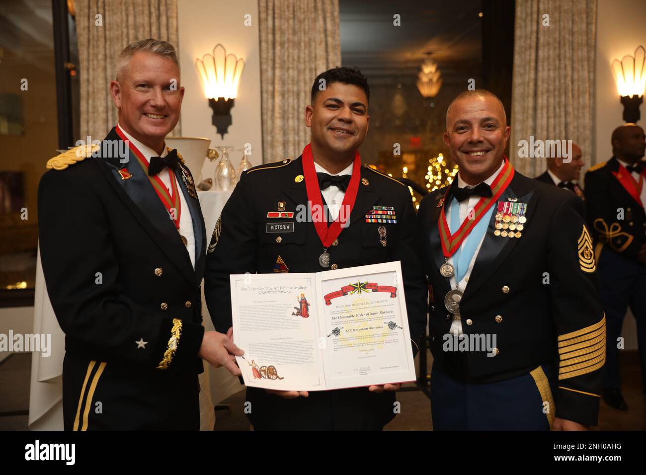 Sgt. 1st Class Bronson Victoria, Secretary General Staff,  32d AAMDC, was inducted into the Honorable Order of Saint Barbara during the Saint Barbara's Social, December 3rd at the Plaza Hotel in El Paso, Texas  The Honorable Order of Saint Barbara is awarded to personnel who have served honorably and with distinction as a member of the Artillery or part of an Artillery unit. Stock Photo