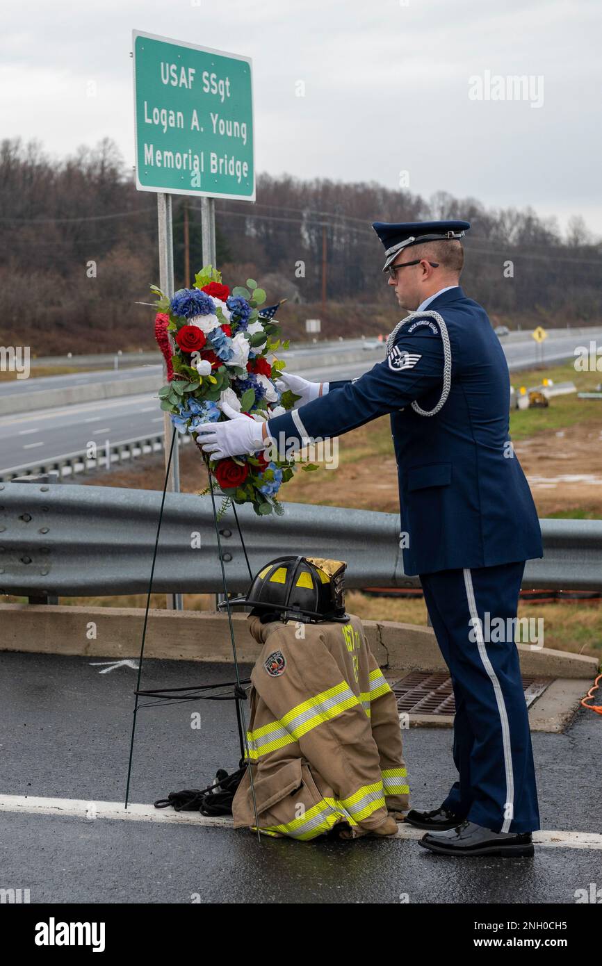 U.S. Staff Sgt. Andrew Bartley, 167th Honor Guard member, places a ...
