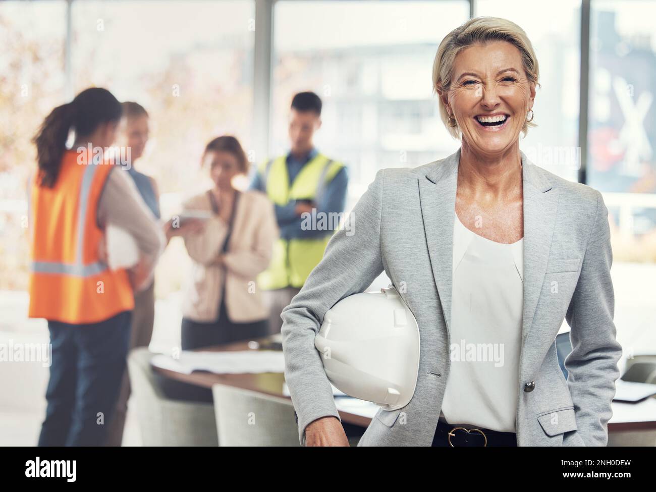 Portrait, construction worker and leader with an engineer woman at work ...