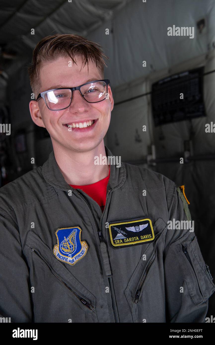 U.S. Air Force Senior Airman Dakota Davis, 36th Expeditionary Airlift Squadron C-130J loadmaster, poses for a photo after landing at Andersen Air Force Base, Guam, Dec. 4, 2022, during Operation Christmas Drop 2022. Loadmasters from the 36 EAS prepared and trained for the safe delivery of each bundle, with many of the bundles weighing over 300 pounds. The aircraft, call sign Santa 11, delivered 14 bundles to the eastern Caroline Islands, included Asor, Falalop, and Fais islands. OCD is the longest-running Department of Defense humanitarian and disaster relief mission. Each year, the USAF partn Stock Photo