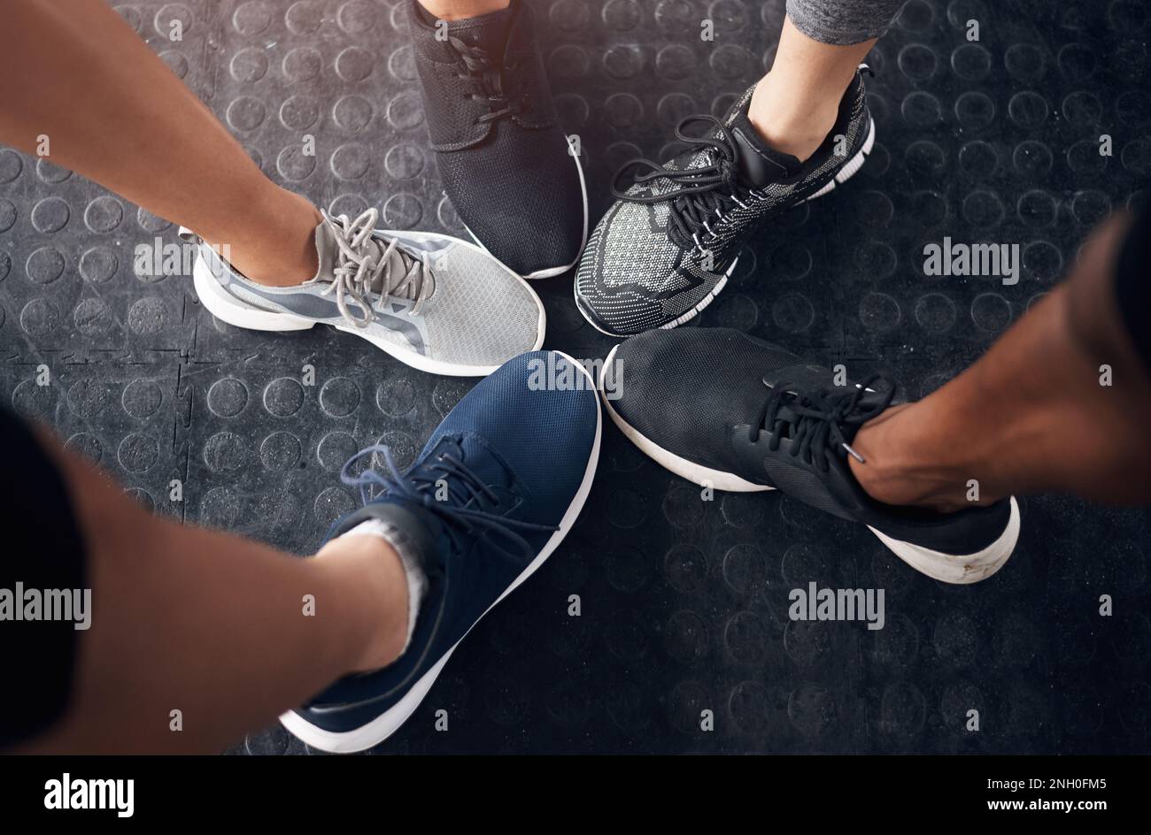 Step in and step up. a group of people standing together in a circle at ...