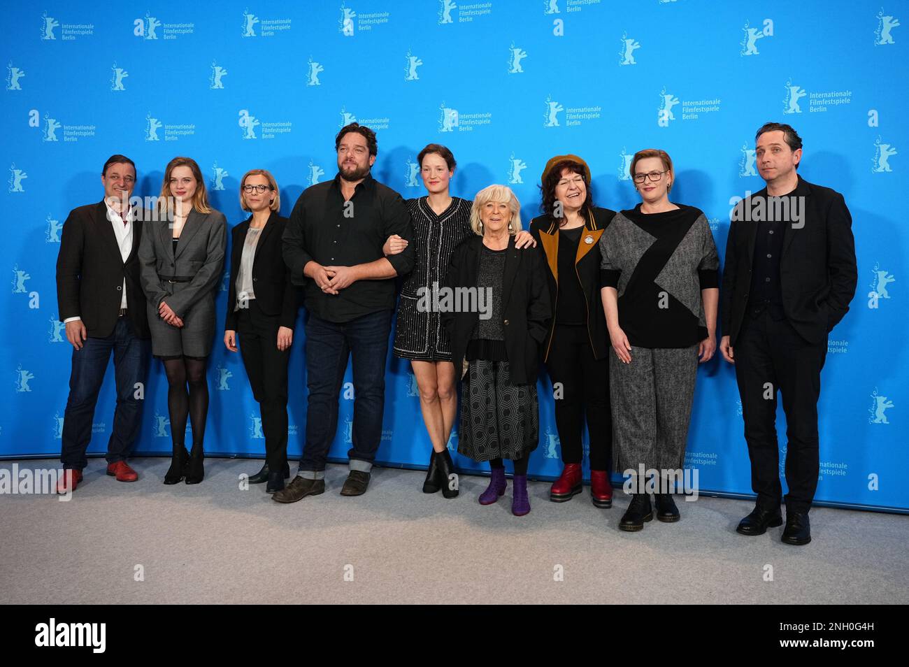 Berlin, Germany. 19th Feb, 2023. Vicky Krieps, actress, Margarethe von Trotta, director and screenwriter, and Ronald Zehrfeld, actor, as well as other members of the film crew, photographed in front of the photo wall at the Berlinale for the film 'Ingeborg Bachmann - Reise in die Wüste'. The film is running in competition. The 73rd International Film Festival runs until February 26, 2023. Credit: Soeren Stache/dpa/Alamy Live News Stock Photo
