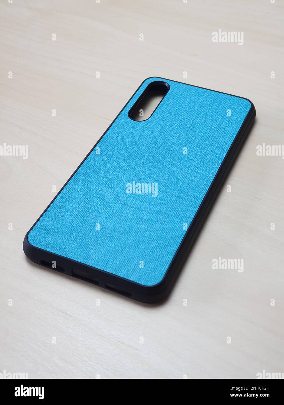 Protective phone case made of dense material with rubber edges. Back