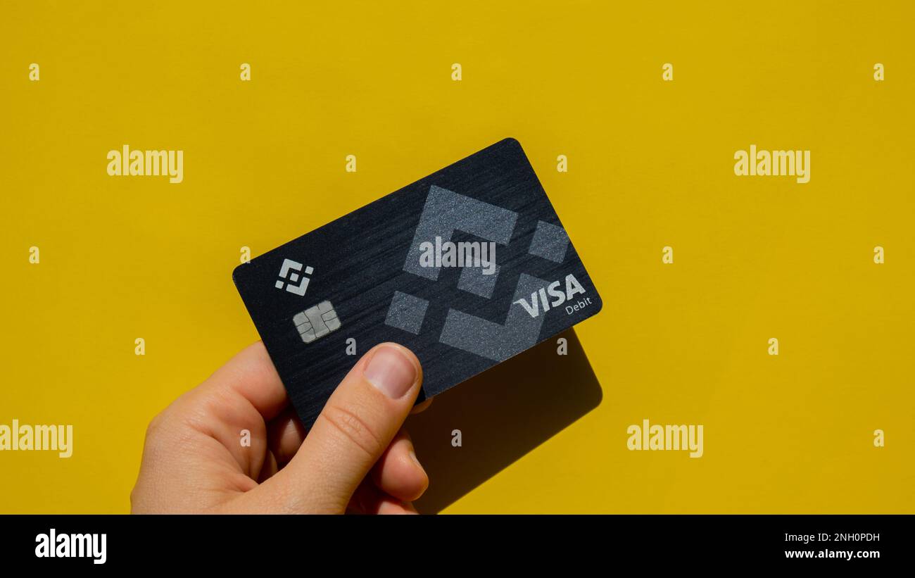 Gdansk Poland - 20 June 2022. Hand holding Black Binance Coin Card. Visa  debit card BNB, Binance Exchange Cryptocurrency Card to buy bitcoin. Crypto  exchange during the market crash. Blockchain cryptocurrency payment