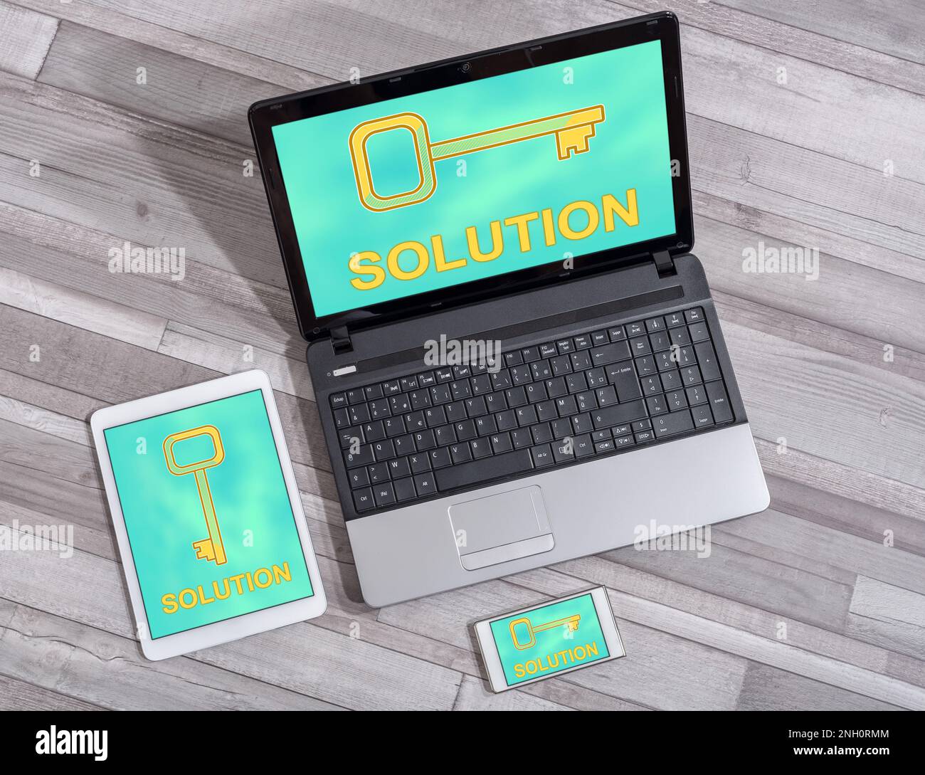 Solution concept shown on different information technology devices Stock Photo