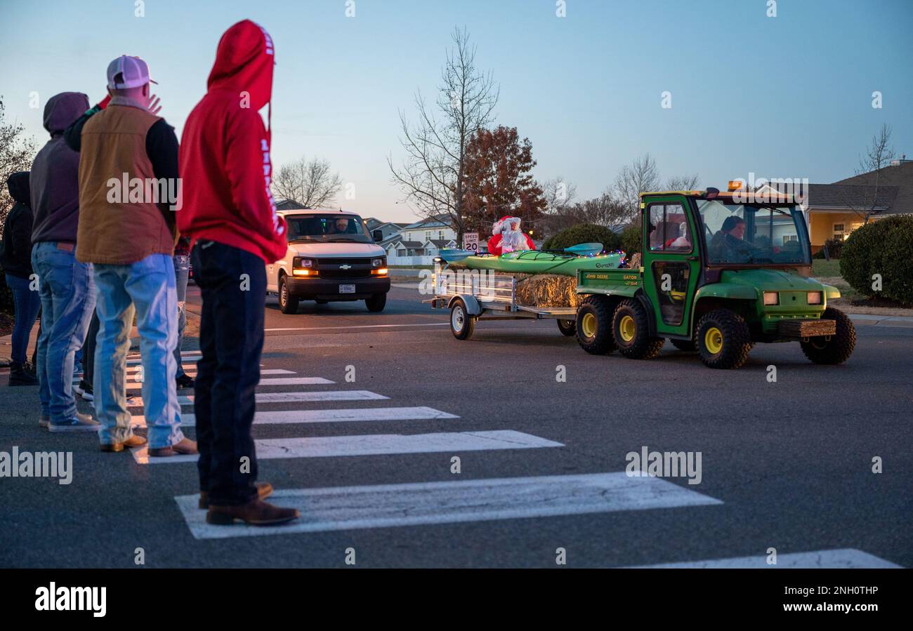 Members of Team Dover watch the holiday parade at Dover Air Force Base