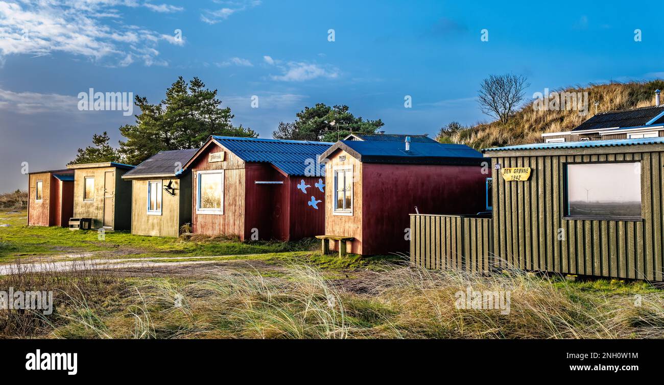 Tipperne nature reserve small fishing cottages and huts in a rural landscape at Rinkoebing fjord, Denmark Stock Photo