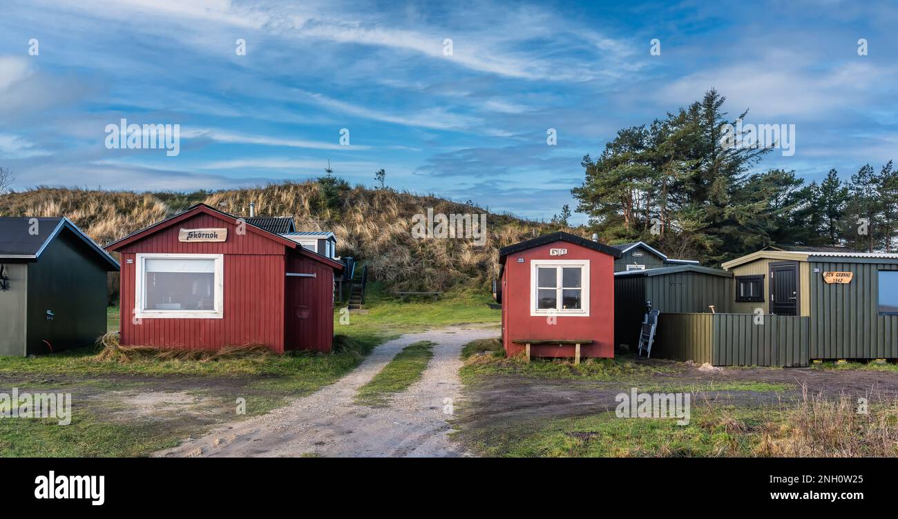 Tipperne nature reserve small fishing cottages and huts in a rural landscape at Rinkoebing fjord, Denmark Stock Photo