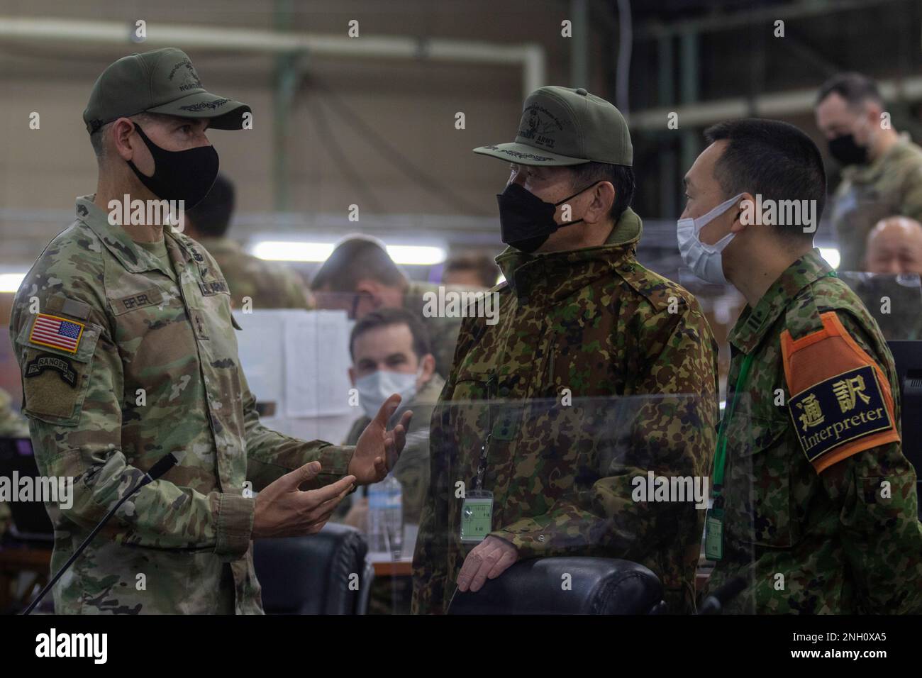 Soldiers assigned to 1st Brigade 11th Airborne Division work together