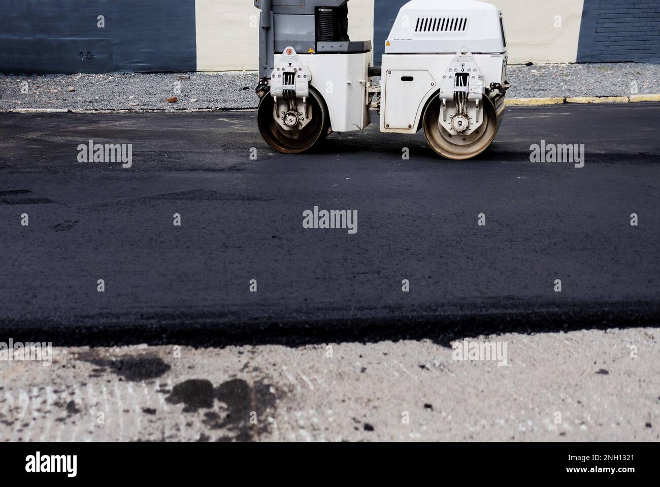 asphalt skating rink on the street. road repair concept. Powerful heavy