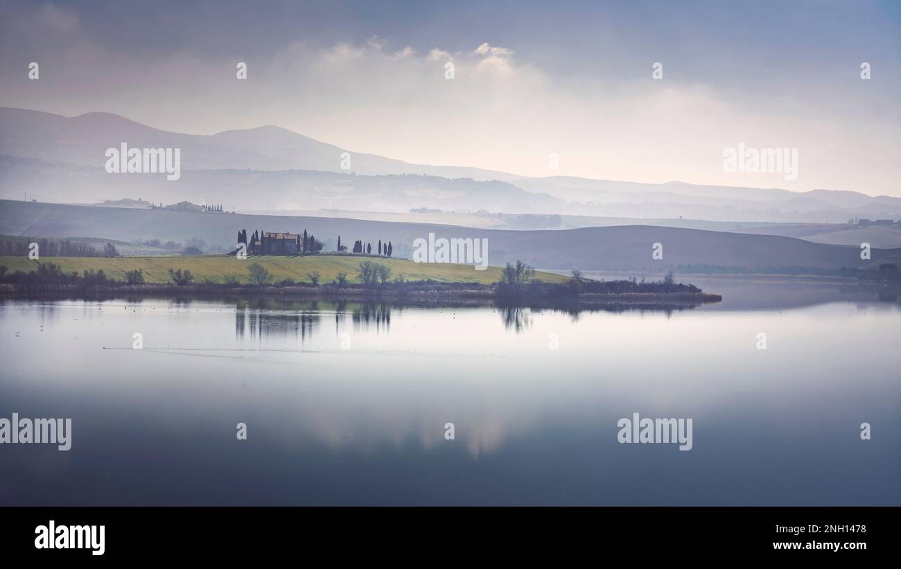 Lake Santa Luce view in a blue misty morning. Colline Pisane territory,Tuscany region, Italy Stock Photo