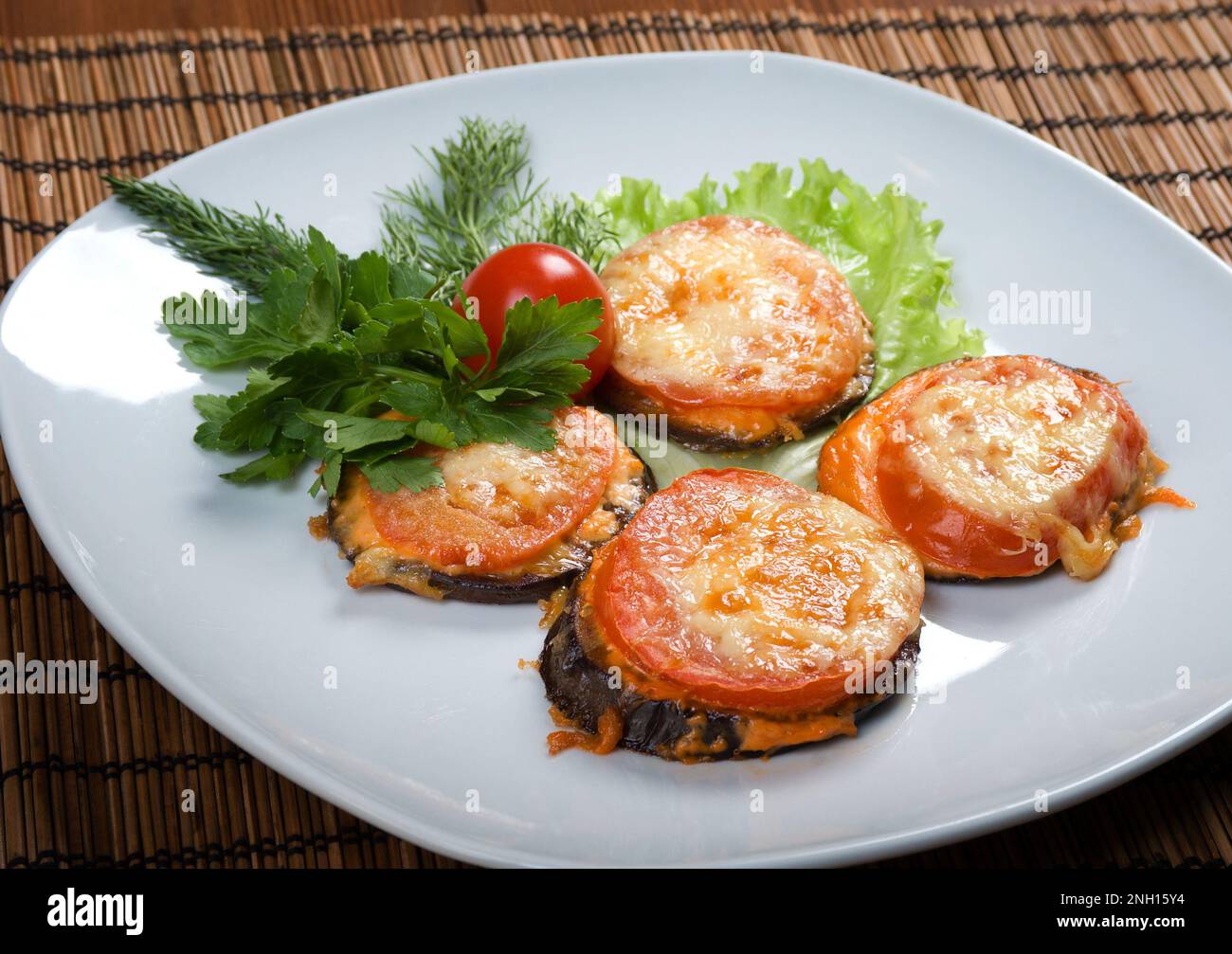 Melanzane a funghetto alla maniera napoletana , fried tomato and eggplant Neapolitan style Stock