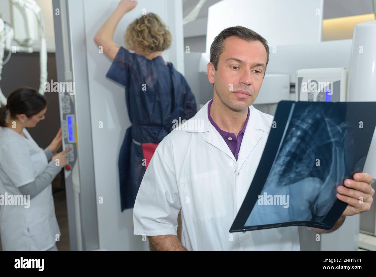 Medical team back smiling hi-res stock photography and images - Alamy