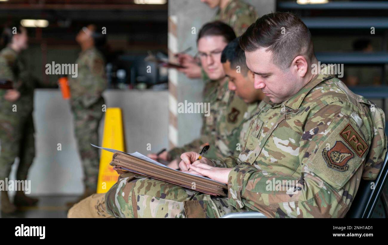 18th Wing Airmen sign sheets for equipment distribution at the ...