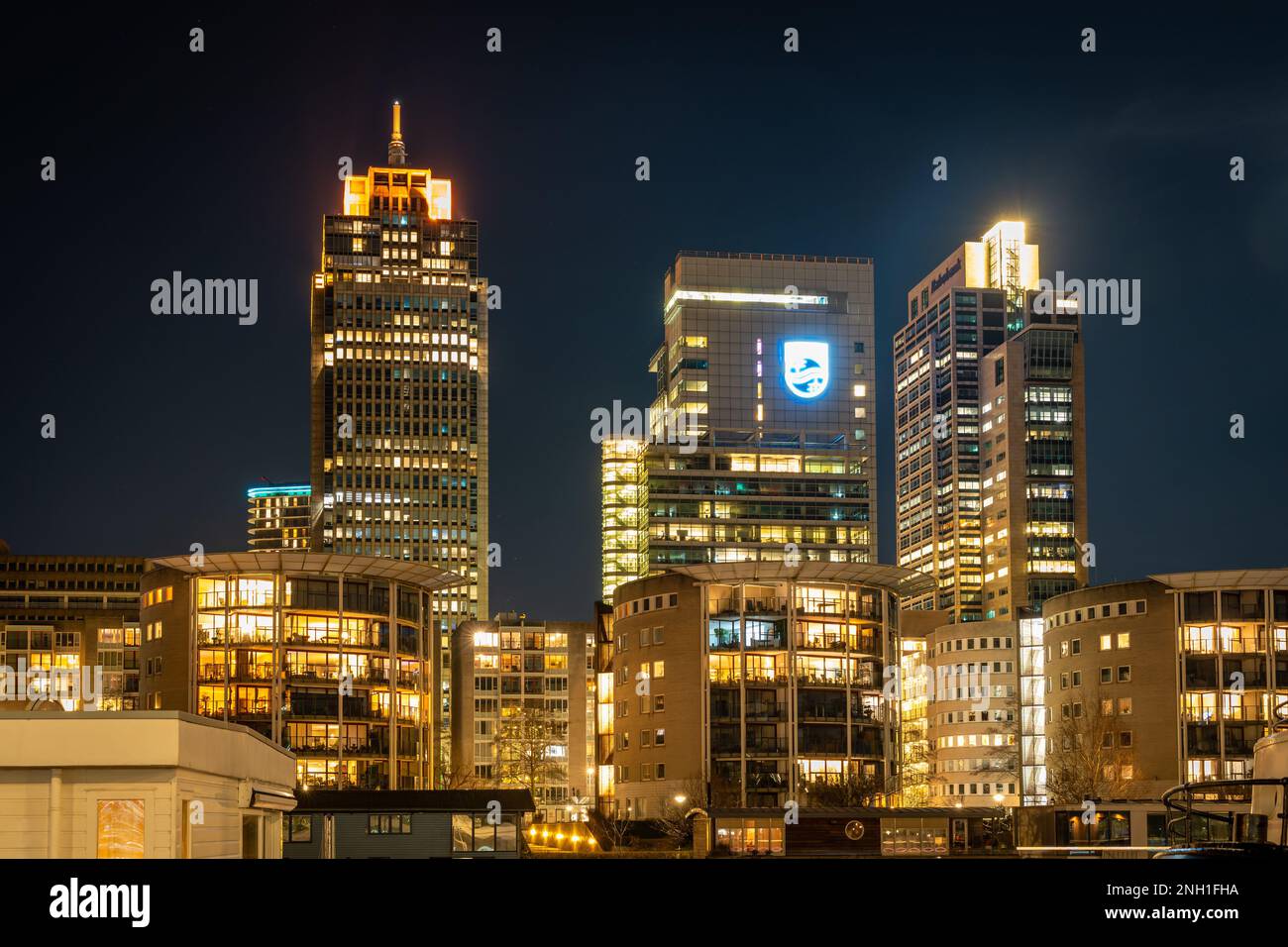 Amsterdam, The Netherlands, 08.02.2023, Modern skyscrapers in Amsterdam at night,  headquarters of dutch multinational corporation Philips at Breitner Stock Photo
