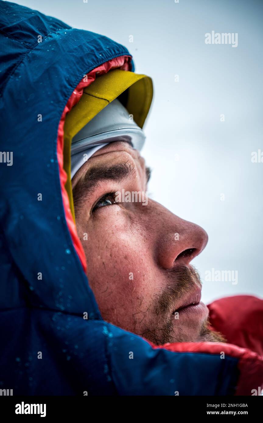 Close up of man's face in winter outdoor clothing Stock Photo