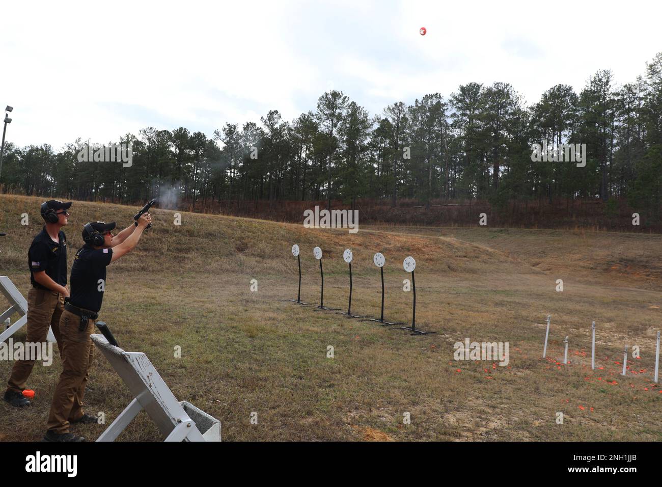 A Soldier from the U.S. Army Marksmanship Unit's Action Shooting Team