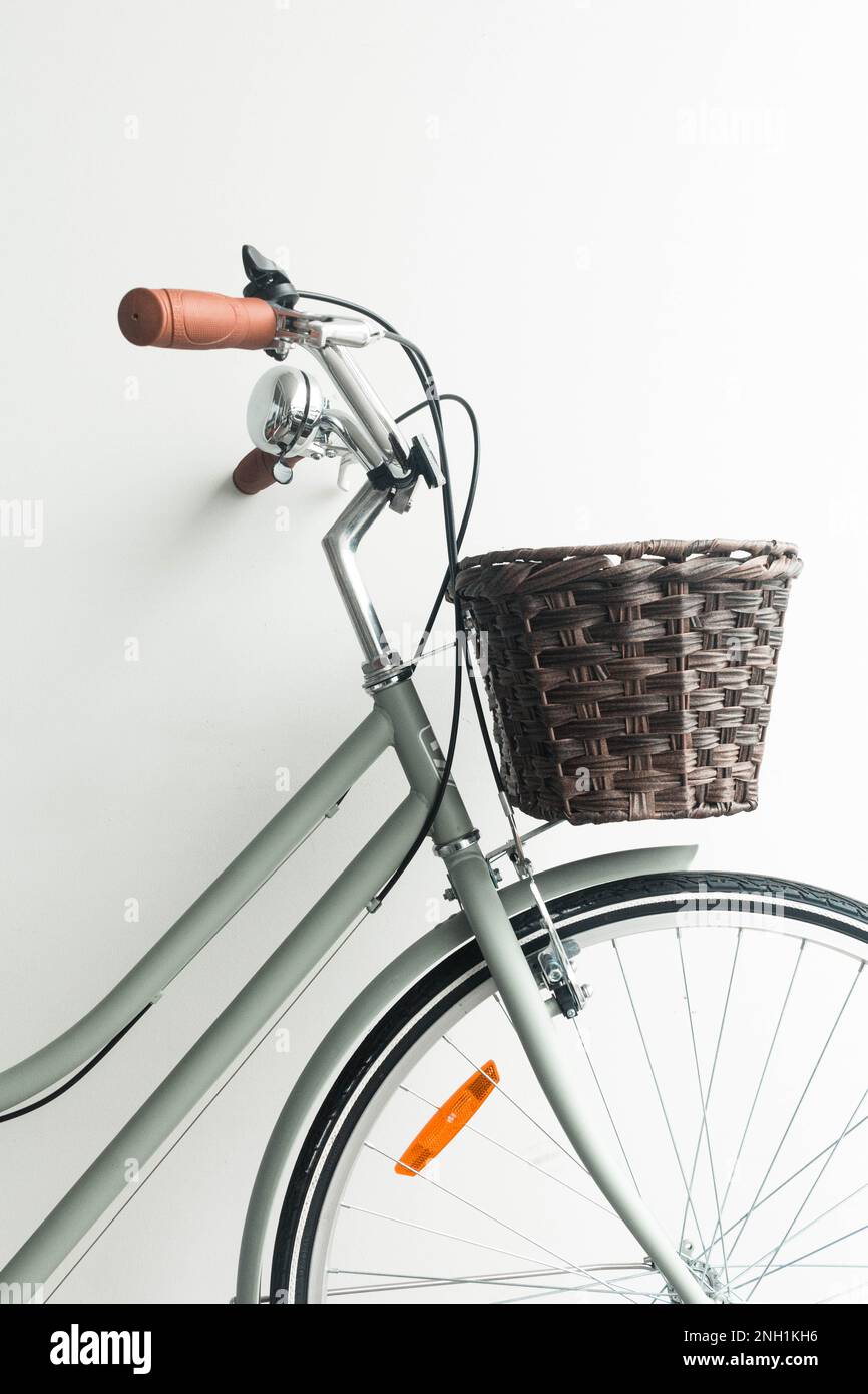 Vintage bicycle green with basket on white background Stock Photo Alamy
