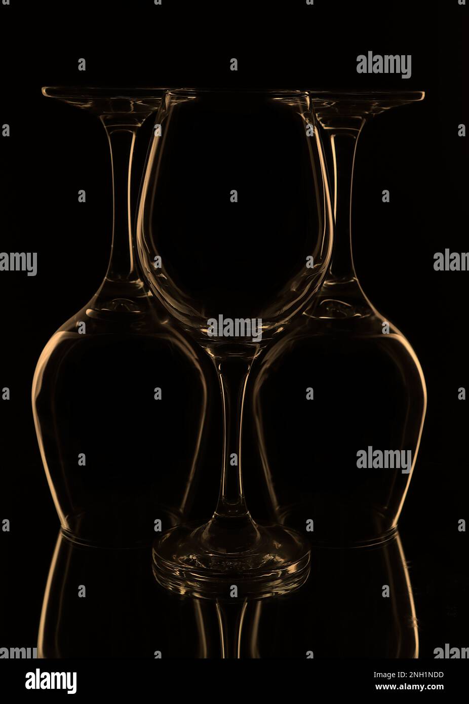 3 glasses lit with rim light Stock Photo - Alamy