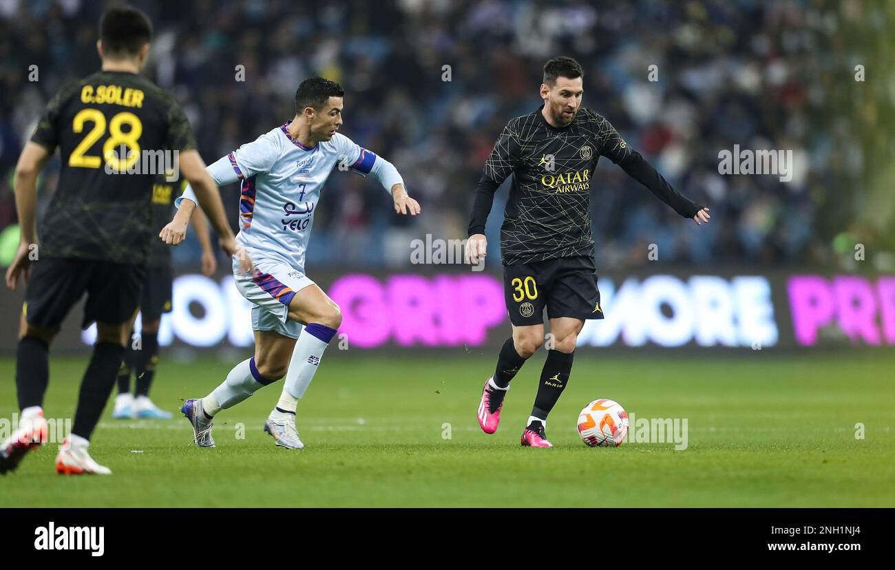 Lionel Messi (R) and Cristiano Ronaldo in action during the Riyadh All-Star XI vs Paris Saint-Germain FC at King Fahd Stadium on January 19, 2023 in Riyadh, Saudi Arabia. Photo by Stringer/ Power Sport Images Stock Photo