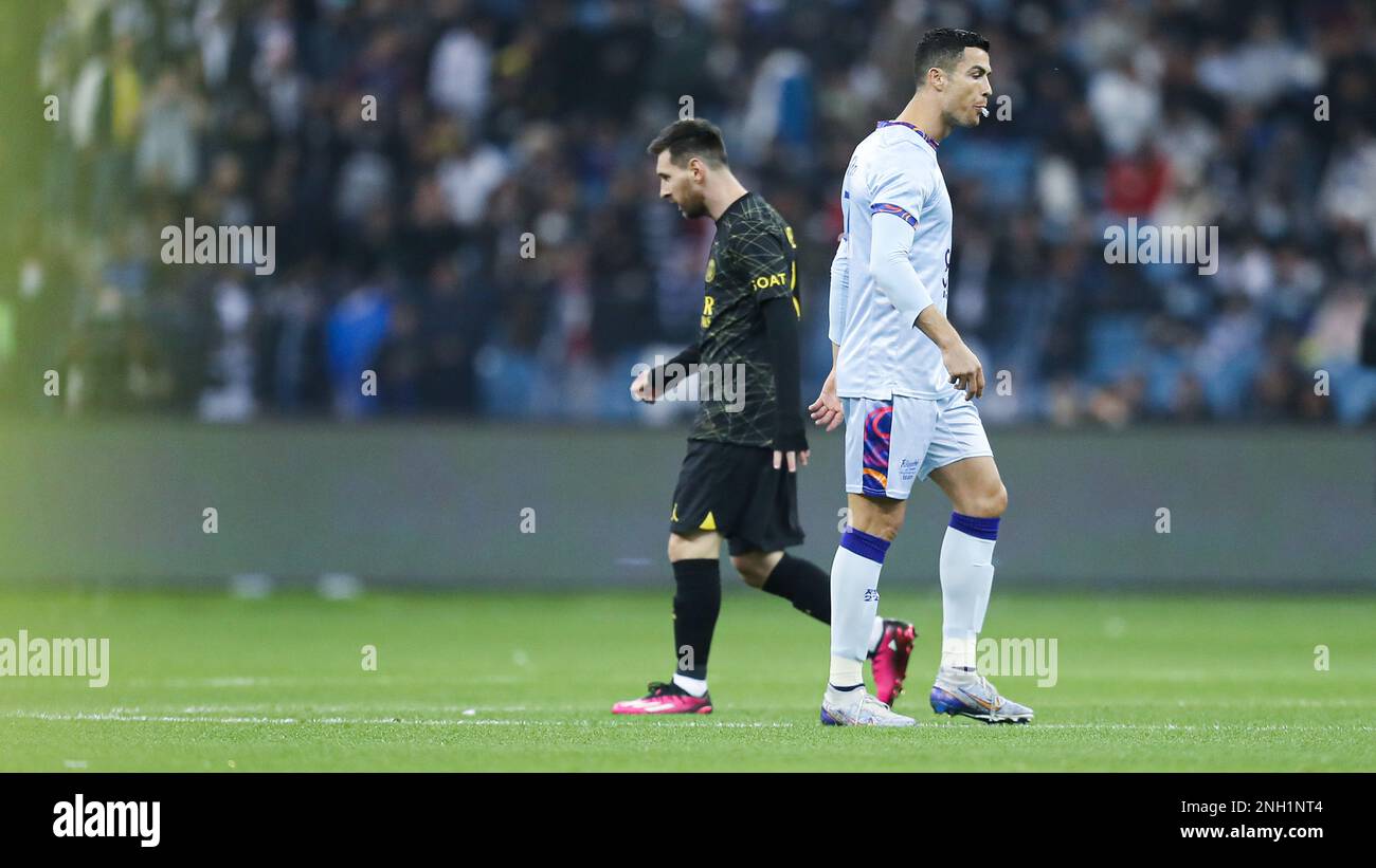 Cristiano Ronaldo spits as Lionel Messi walks near during the Riyadh All-Star XI vs Paris Saint-Germain FC at King Fahd Stadium on January 19, 2023 in Riyadh, Saudi Arabia. Photo by Stringer/ Power Sport Images Stock Photo