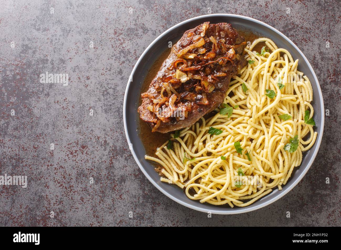 Zwiebelrostbraten German beef roast in onion sauce and spaetzle pasta ...