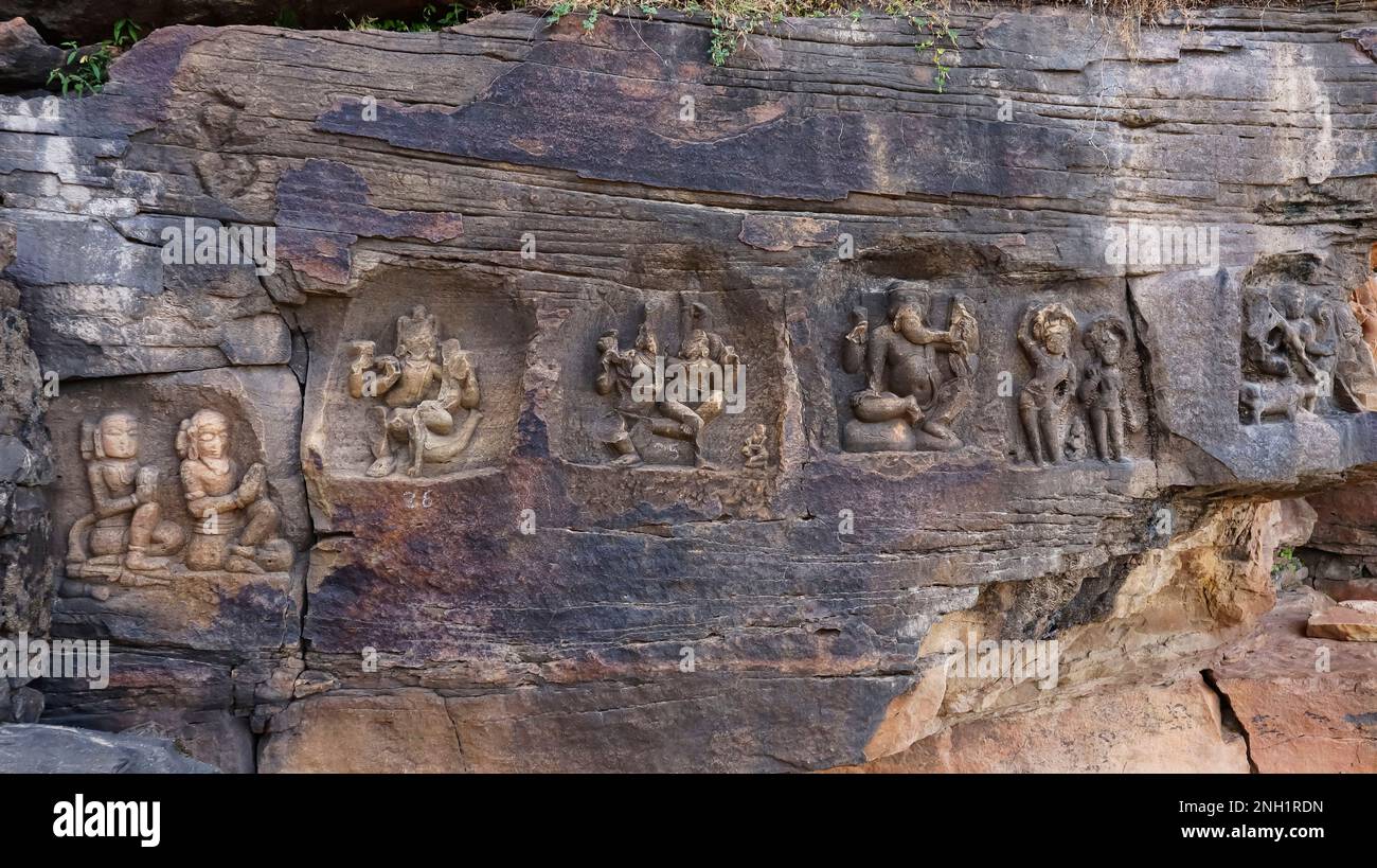 Carvings of Hindu Gods and Goddesses on the Wall of Ajaygarh Fort, Panna, Madhya Pradesh, India. Stock Photo