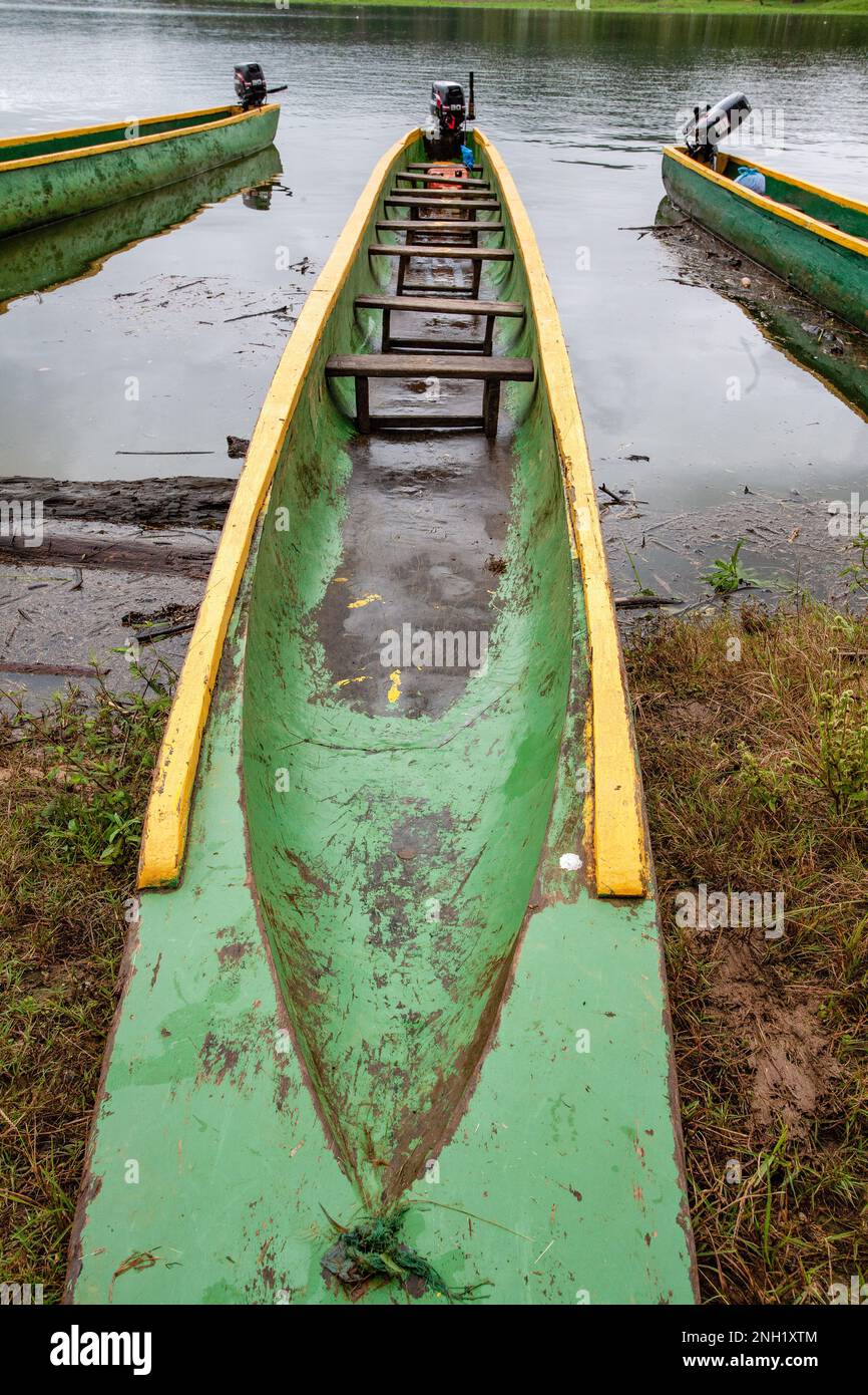 An Embera dugout canoe or cayuco hand-made from a single hollowed-out tree trunk, about 30 feet in length. Stock Photo