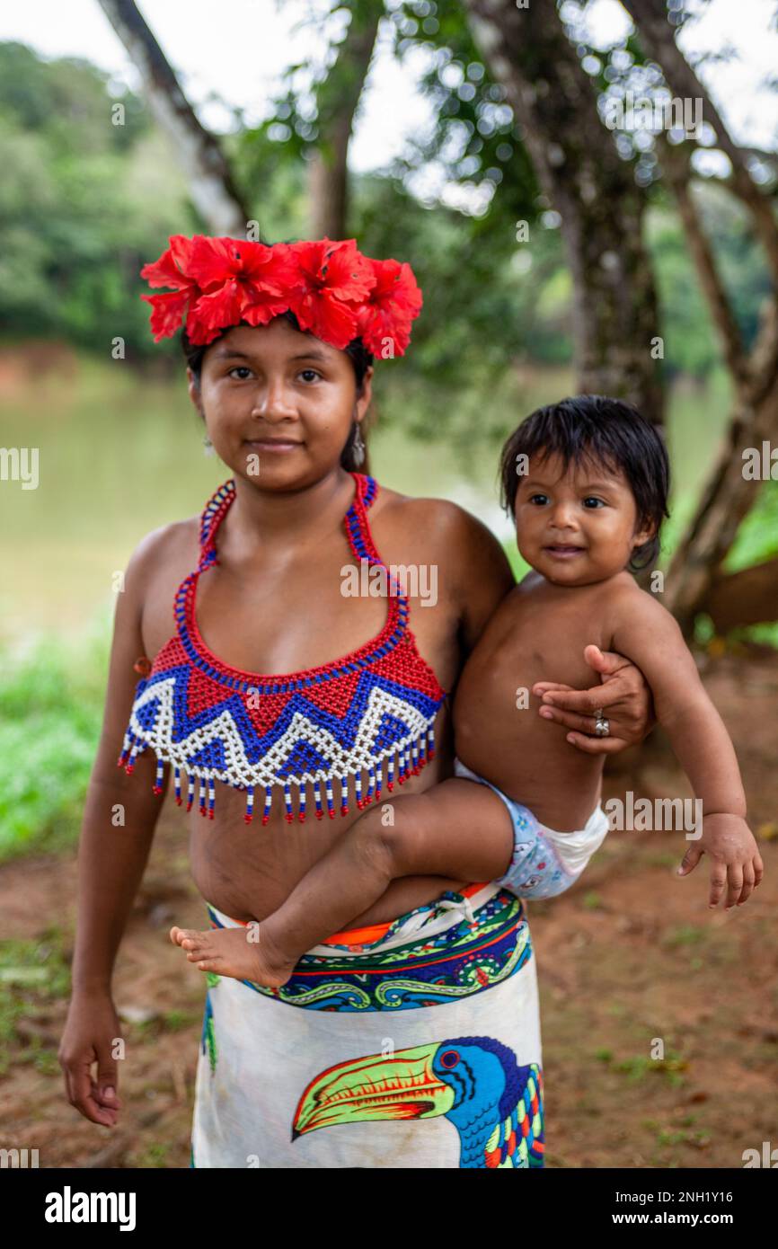 An indigenous Embera woman and her toddler in an Embera village in Panama. Stock Photo