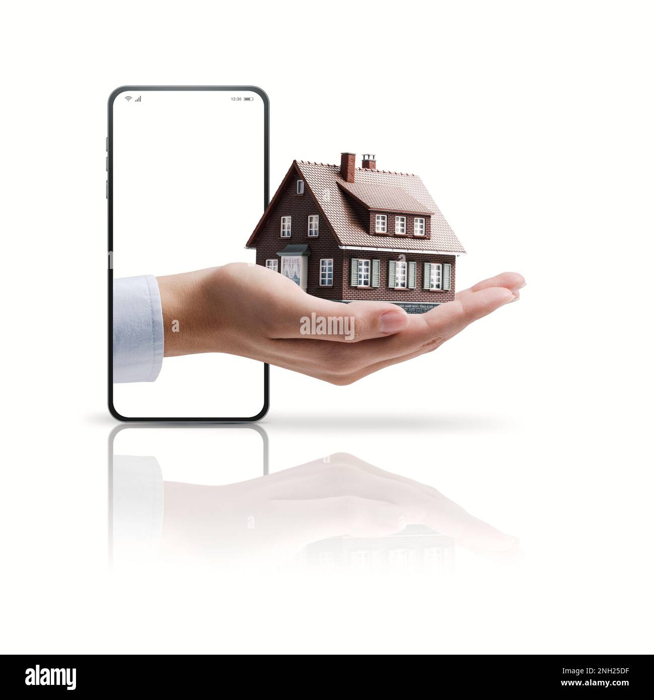 Real estate agent hand showing a model house in a smartphone screen, real estate app concept