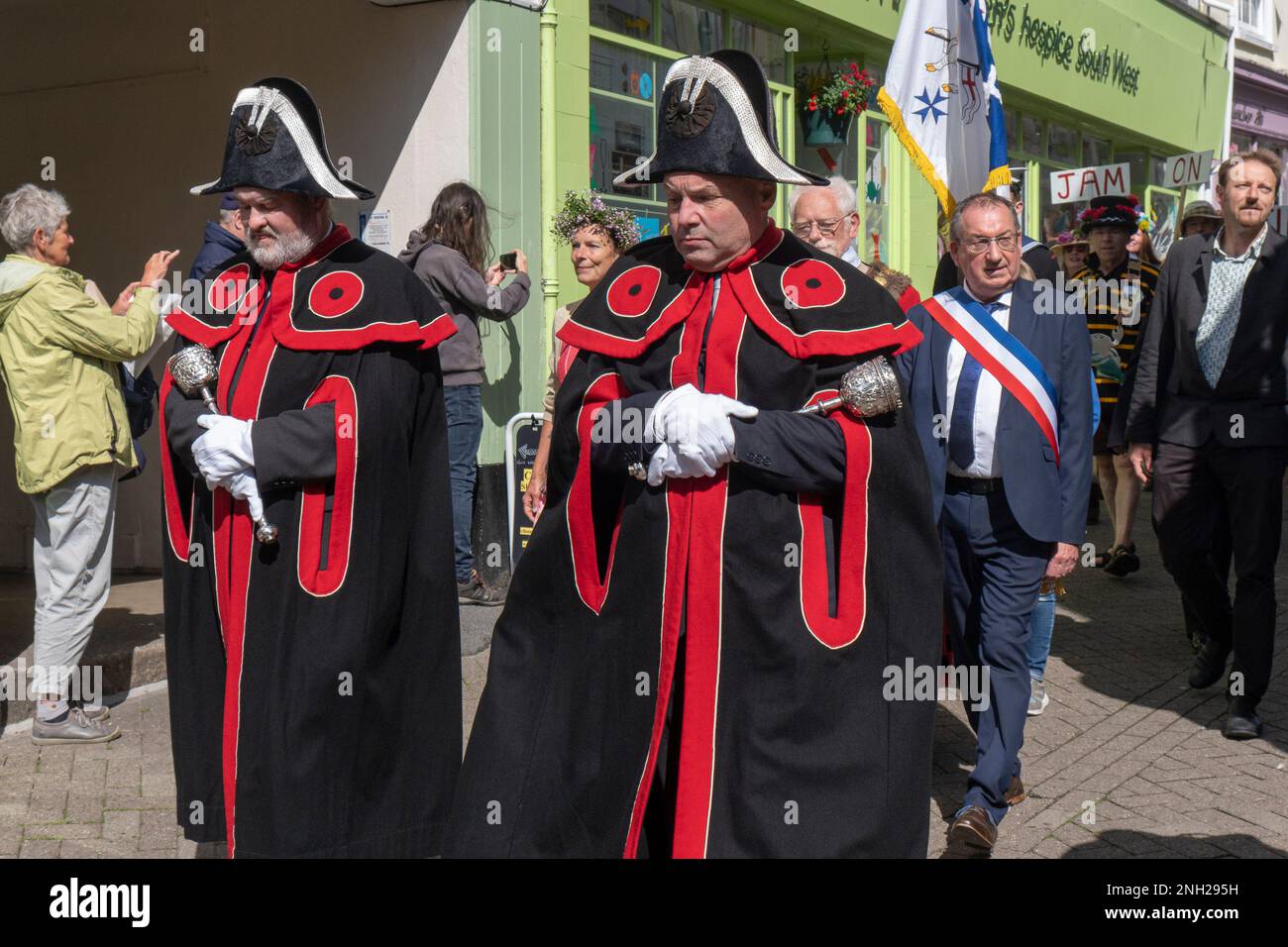 The two Mace Bearers leading the Civic Parade during Mazey Day Golowan