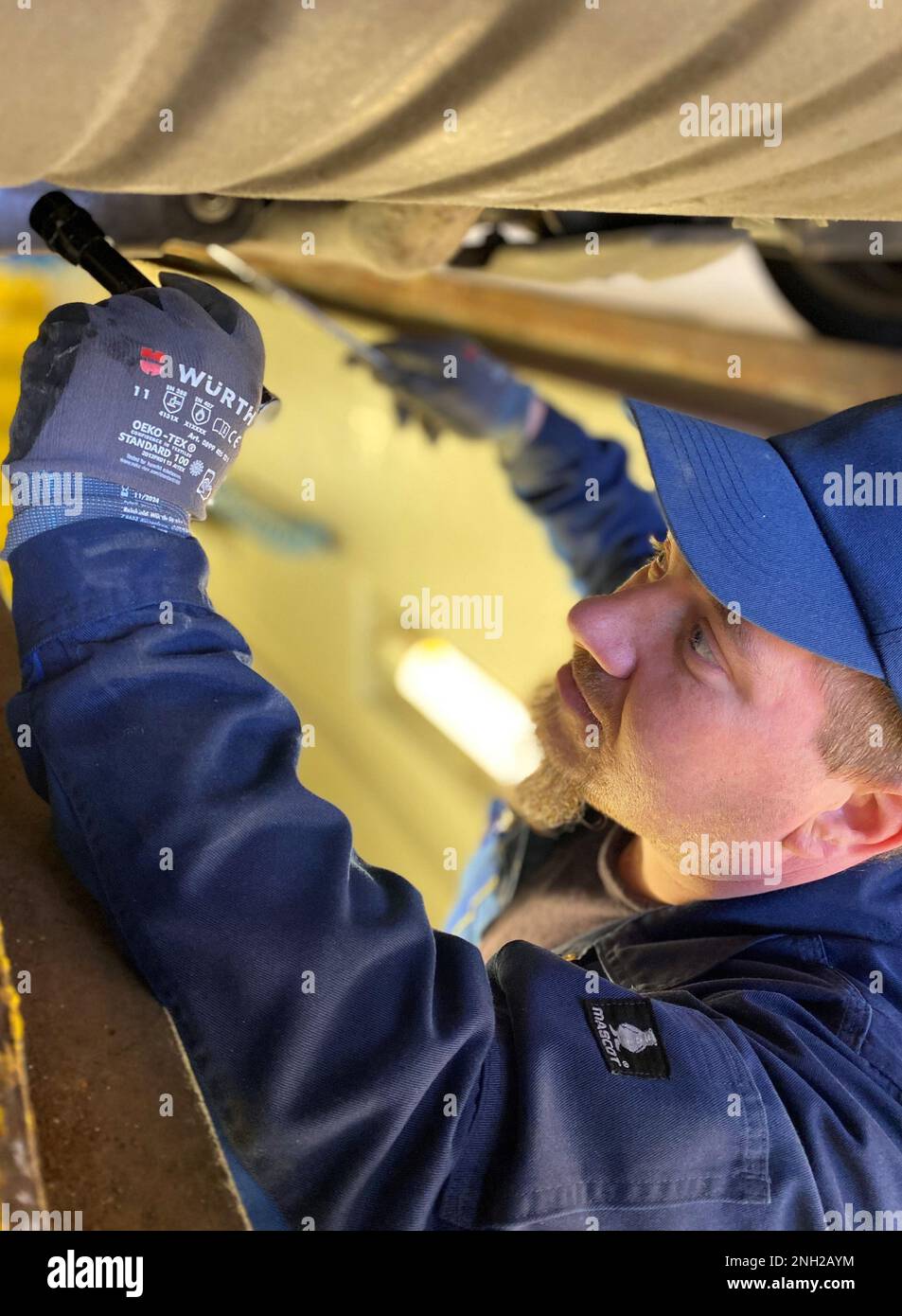 Tobias Mayer inspects a privately owned vehicle at the Baumholder POV