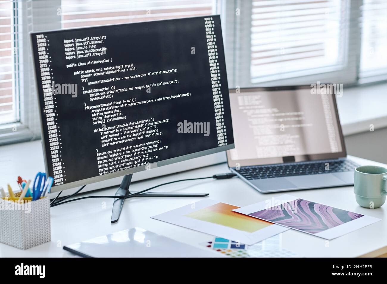 Background image of computer screen with code lines at software ...