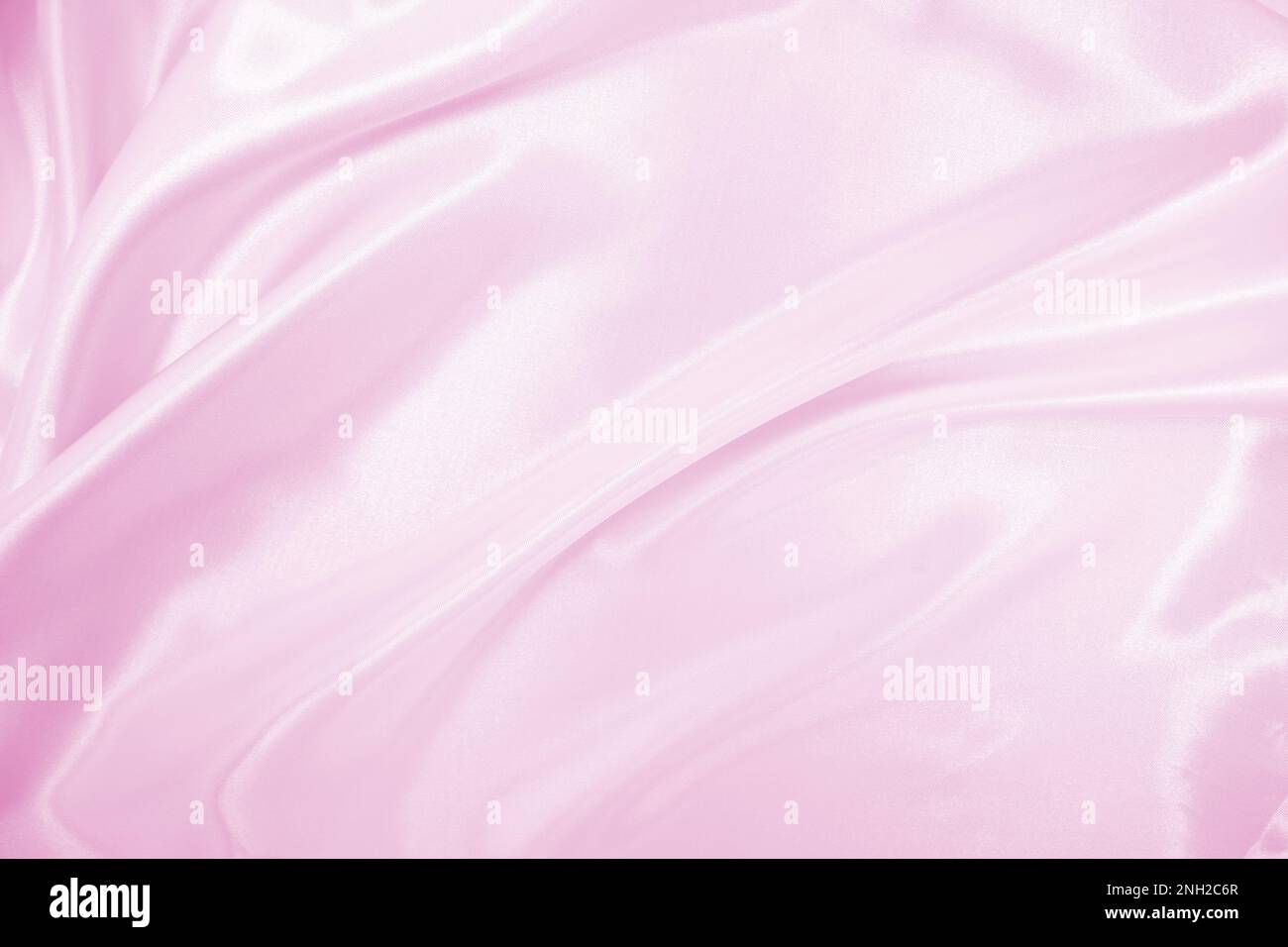 Smooth elegant pink silk or satin texture can use as wedding background ...
