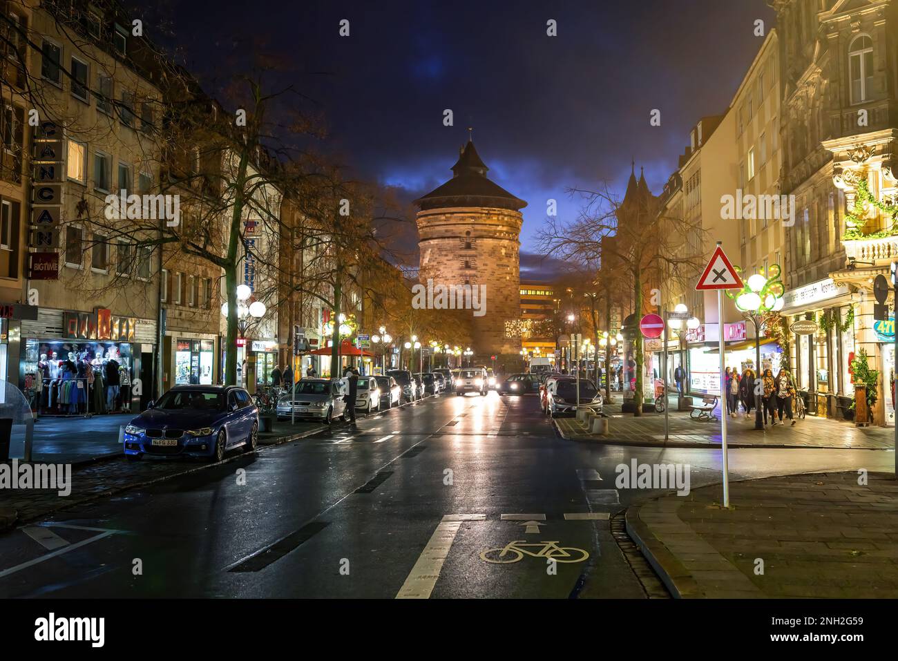 Street and Spittlertorturm Tower at night - Nuremberg, Bavaria, Germany Stock Photo