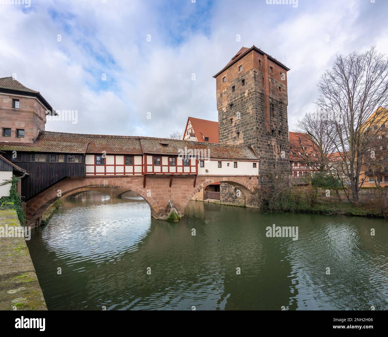 Henkerbrucke bridge and Wasserturm (Water Tower) at Pegnitz River - Nuremberg, Bavaria, Germany Stock Photo