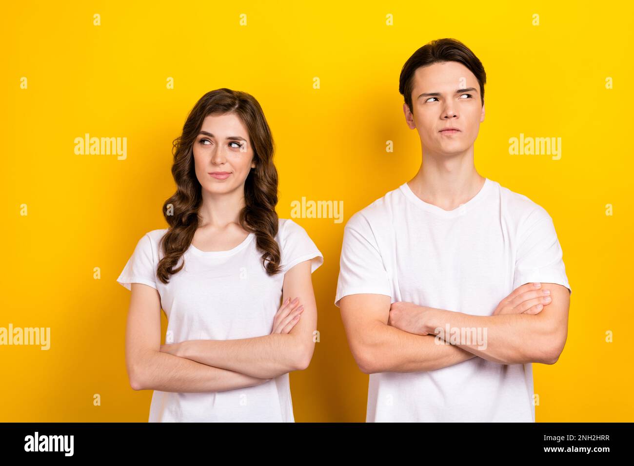 Photo of two best friends folded arms suspicious looking different ...