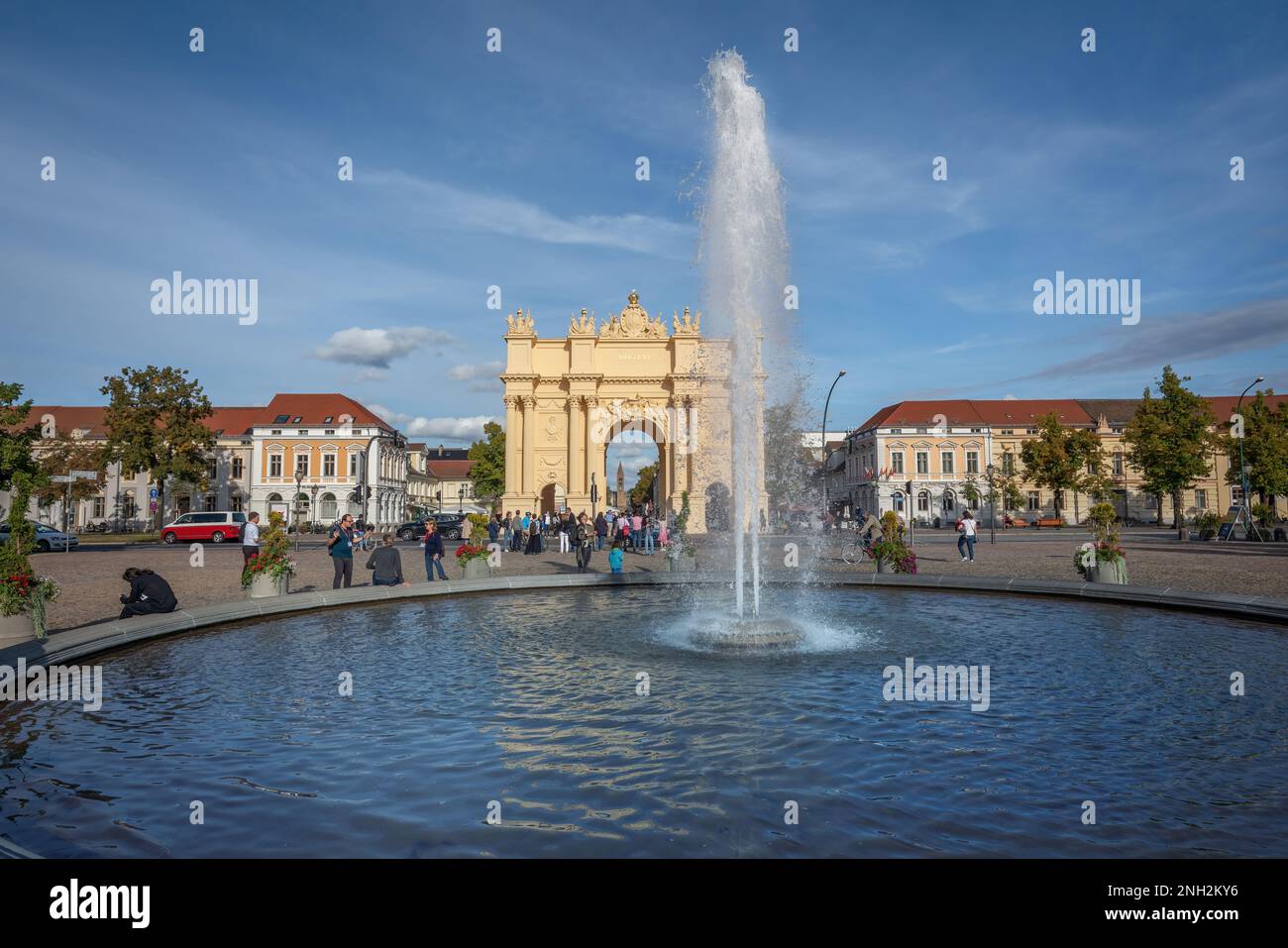Brandenburg Gate (Brandenburger Tor) and fountain at Luisenplatz Square - Potsdam, Brandenburg, Germany Stock Photo