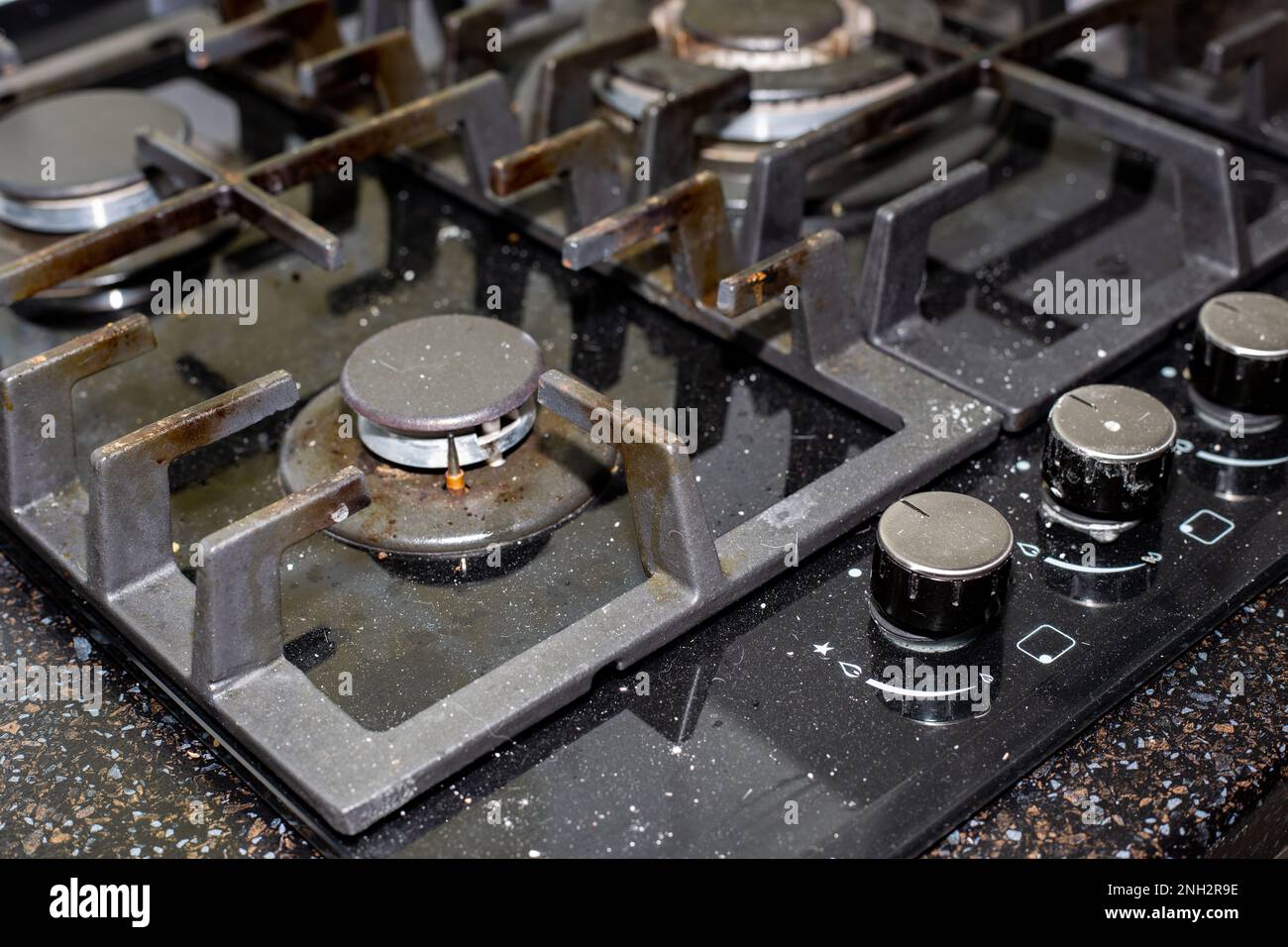 Gas stove with dirty glassceramic surface. Cooking stove care Stock Photo Alamy