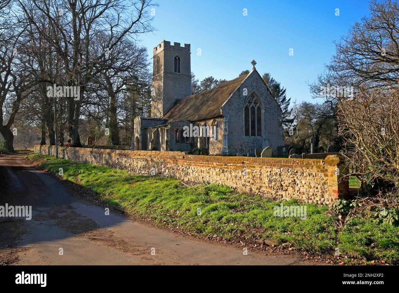 A view from the south-east of the Church of St Michael in the Norfolk Broads in the village of Irstead, Norfolk, England, United Kingdom. Stock Photo